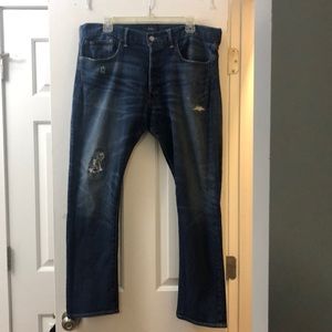 Distressed slim fit polo jeans